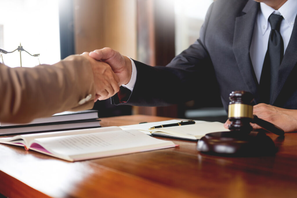 Lawyer shaking hands with a client. If you are a whistleblower and are looking for a False Claims Act attorney in Houston to represent you in a qui tam suit, our experienced team of attorneys can help
